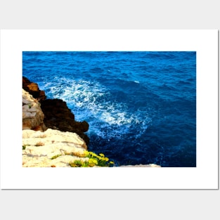 View from a high rocky coast of Polignano a Mare at the wavy Adriatic sea Posters and Art